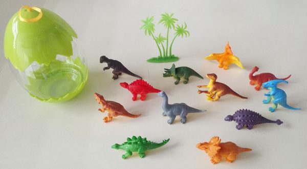Mini plastic dinosaur toy filled easter egg